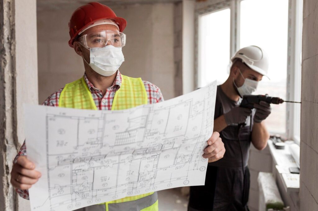 Asbestos Before Remodeling 1 - CleanPro of America Homeowner reviewing environmental assessment results
